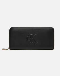 CALVIN KLEIN SCULPTED ZIP AROUND DEBOSS (Dimensions: 19 x 9.5 cm.)